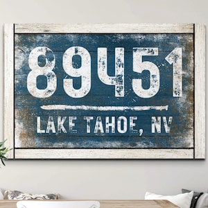 May include: A blue and white distressed wood sign with the number 89451 and the text "LAKE TAHOE, NV".