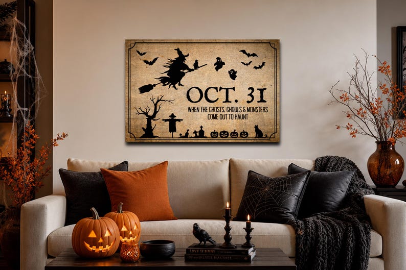 May include: A rectangular wall sign with a vintage beige background featuring black silhouettes of a witch on a broom, bats, ghosts, a tree, a scarecrow, and pumpkins. The text reads OCT. 31 WHEN THE GHOSTS, GHOULS & MONSTERS COME OUT TO HAUNT.