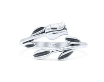 May include: A silver-coloured ring shaped like a tulip flower with leaves. The adjustable ring has the text "S925" on the band. The design is detailed and appears to be made of metal.