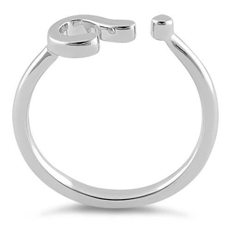 Puede incluir: Anillo de plata de ley con dise&ntilde;o de signo de interrogaci&oacute;n.