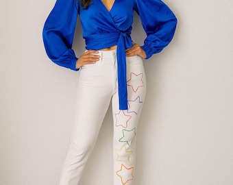 Denim blanco talla 2 cintura 24 con estrellas delineadas multicolor