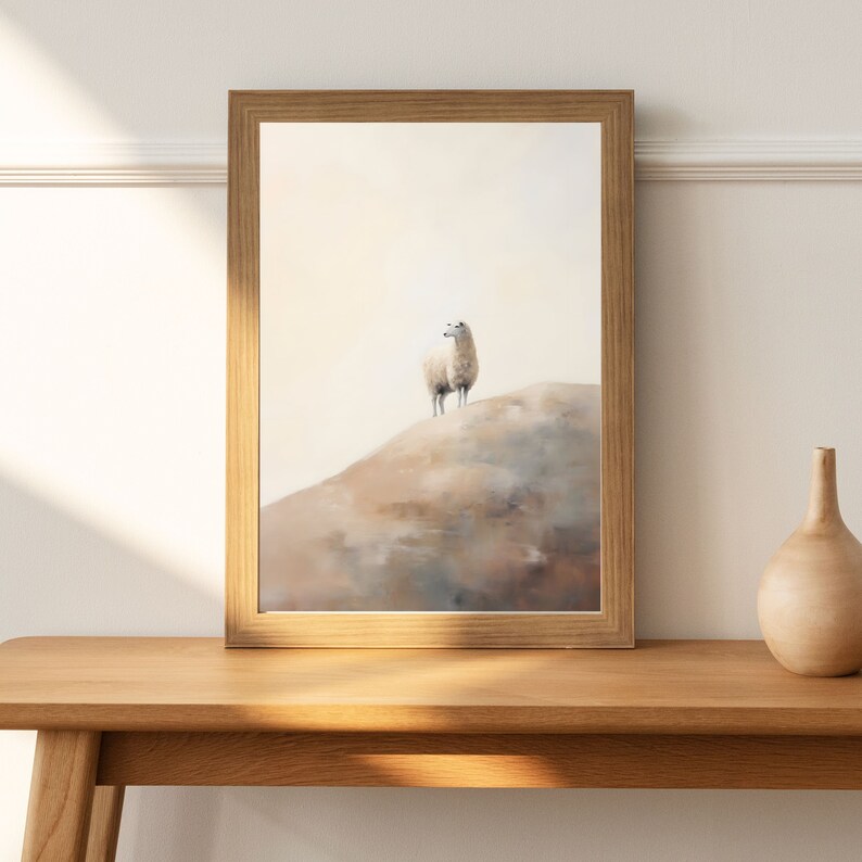 May include: A framed painting depicting a white llama standing on a hilltop, against a soft, muted background of brown and blue tones.