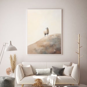 May include: A painting depicting a white sheep standing on a hilltop, with a soft, muted colour palette of beige, brown, and white.