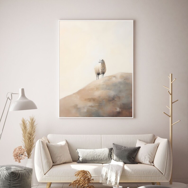 May include: A painting depicting a white sheep standing on a hilltop, with a soft, muted colour palette of beige, brown, and white.