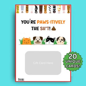 May include: A white gift card with a red border features the text "YOU'RE PAWS-ITIVELY THE SH*T!" above cartoon cats and dogs. The card includes a space for a gift card and the text "20 UNIQUE CARDS!"