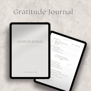 May include: A digital tablet displaying a gratitude journal with the text "Gratitude Journal" on the screen. The journal includes prompts for daily reflection and affirmations.