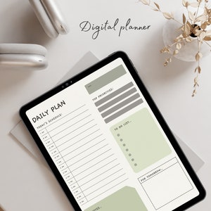 May include: A digital planner on a tablet screen with a green and gray color scheme. The planner includes sections for daily schedule, top priorities, to do list, and for tomorrow.