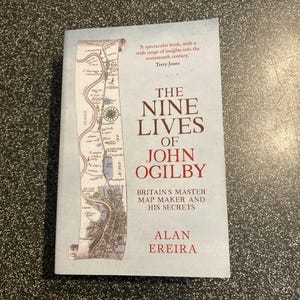 May include: A rustic wooden sign with the text "Welcome to our home" in white lettering. The sign has a distressed finish and a simple, inviting design, ideal for front door decor.