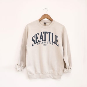 Seattle Sweatshirt | Unisex Space Needle & City Skyline Pullover | Perfect Gift for Emerald City Lovers | Unique Seattle, WA Souvenir Top