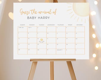 May include: A white calendar with a yellow sun graphic and the text "Guess the arrival of BABY HARRY". The calendar is set up for June 30th to August 2nd.  The text "Due Date" is written in blue on the 16th of July.