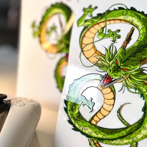 May include: A green dragon with yellow accents and red eyes is curled up in a circle. The dragon is on a white background.