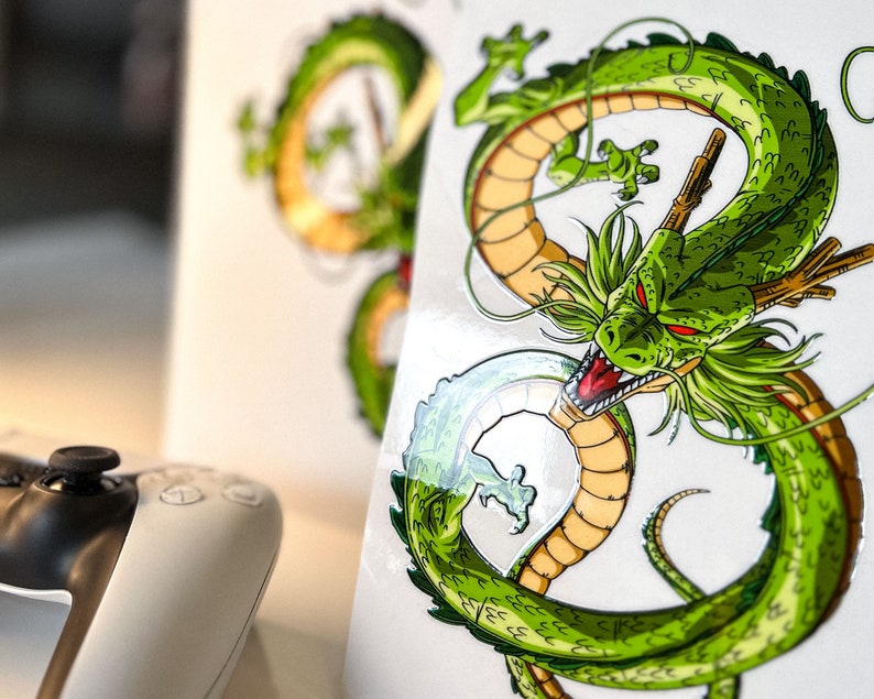 May include: A green dragon with yellow accents and red eyes is curled up in a circle. The dragon is on a white background.