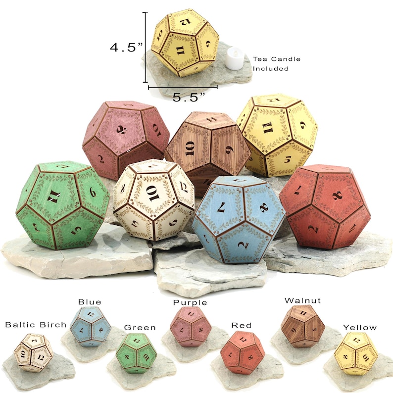 May include: A collection of dodecahedron-shaped candle holders in various colors, including yellow, red, green, and blue. Each holder is approximately 5.5 inches wide and 4.5 inches tall, with numbers and decorative leaf patterns. A tea candle is included.