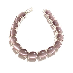 Vintage Avon light purple cats eye moonglow bracelet glass silver tone February birthstone jewelry tennis