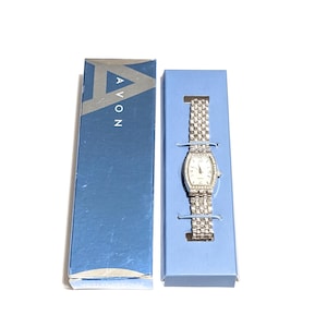Avon Vintage 2005 watch,green,blue, and silver bracelet. It needs a new battery. Avon 2005 Birthstone Sparkling Ring Watch Blue Silver Blue  main image 4