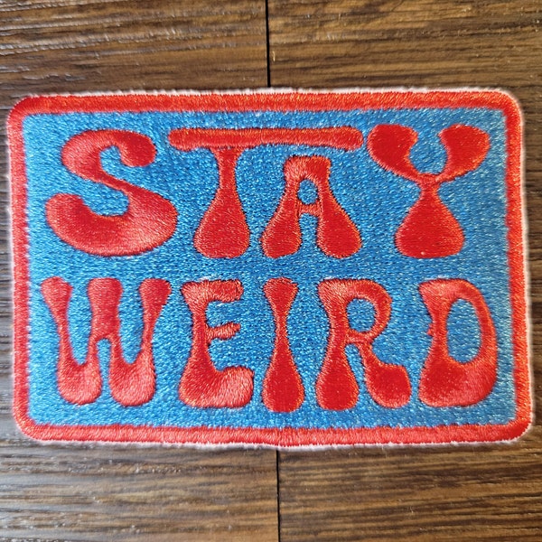 Stay Weird Iron-on or Sew-on  Machine Embroidered Patch with Red Lettering and Blue Background