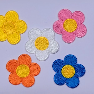 May include: A rustic wooden sign with the text "Welcome to our home" in white lettering. The sign features a distressed finish and a simple, inviting design, perfect for entryway decor.