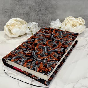 Adjustable book cover - fabric dust jacket - book sleeve - bookish gift - book accessories - sneaky snakes