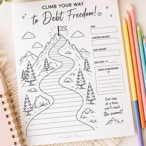 May include: A white paper debt tracker sheet featuring a black line drawing of a mountain path with a flag at the summit. The text reads CLIMB YOUR WAY to Debt Freedom!, DEBT, STARTING BALANCE, GOAL AMOUNT, EACH STEP = $, NOTES & MOTIVATION, and more.