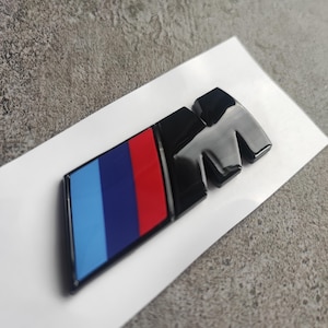 BMW M emblem, 55 x 20 mm, 74 x 26 mm, 90 x 30 mm NEW Black glossy lettering, self-adhesive, sticker, New in foil, trunk