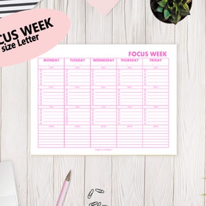 May include: A printable weekly planner with the title "Focus Week" in pink text. The planner is divided into five columns for each day of the week: Monday, Tuesday, Wednesday, Thursday, and Friday. Each column has a section for "Morning", "Afternoon", "Evening", and "Notes".