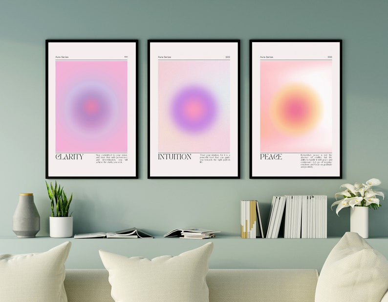 May include: Three framed prints with abstract gradient circles in pink, purple, and orange hues. Each print features a different color scheme and a word at the bottom: "Clarity", "Intuition", and "Peace".