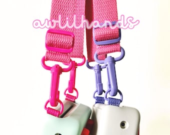 Seasonal Raspberry Yoto Mini crossbody strap with Grape or Raspberry hardware for little children