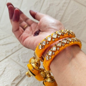 Kundan Pair Bangles Jhumki With Potli bag, Mehendi, Haldi Return Gifts| Colored Silk Thread Kundan Free Size Bangles for Bridesmaids, Women