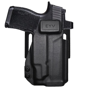 May include: Black handgun in a black holster. The handgun has a textured grip and a sight on top. The holster has the letters "EYV" on the front. The image is set against a white background.