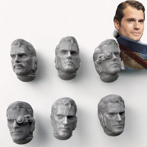 Puede incluir: Siete cabezas en miniatura de plástico gris con diferentes expresiones faciales. Algunas cabezas tienen gafas. Las cabezas son para usar en un juego de mesa o pasatiempo.