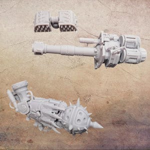 May include: Three unpainted, light gray miniature war game components. The components include a cannon, a spiked arm, and a set of jaws. The components are designed for use in tabletop war games.