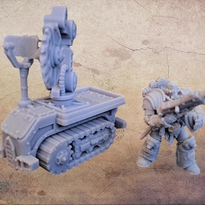 May include: A light grey miniature model of a tracked vehicle with a large circular gear and a smaller figure holding a weapon. The vehicle has a rectangular platform and detailed track treads. The figure is wearing armour and carrying a rifle.