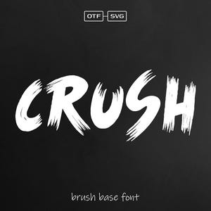 May include: White brush font design on a black background. The word "CRUSH" is written in a bold, brush-stroke style font. The text "brush base font" is written below the word "CRUSH".