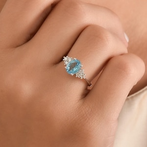 Blue Topaz Engagement Ring: Dainty Oval Gemstone, Sterling Silver or Gold