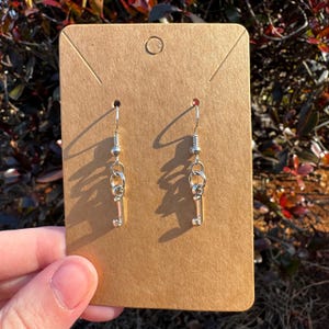 Pendientes colgantes de plata con la letra J