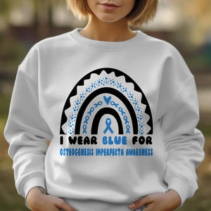 i wear blue for Osteogenesis Imperfecta awareness png svg
