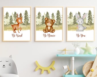 May include: Three framed watercolor prints featuring woodland animals. The first print shows a deer with the text "Be Kind". The second print shows a bear with the text "Be Brave". The third print shows a rabbit with the text "Be You".