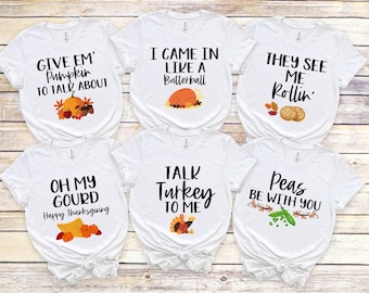 May include: White t-shirts with Thanksgiving-themed graphics and text. Designs include phrases like "Give Em' Pumpkin to Talk About," "I Came in Like a Butterball," and "They See Me Rollin'." Other shirts say "Oh My Gourd Happy Thanksgiving," "Talk Turkey to Me," and "Peas Be With You."