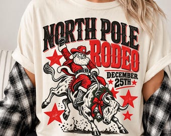 Christmas Rodeo PNG, projekt kowboja Mikołaja jadącego na byku (pobieranie cyfrowe)