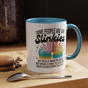 Sarkastisk "Vissa människor är som slinkies"-mugg, rolig present till kollega, vän