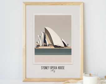 May include: A framed print of a minimalist illustration of the Sydney Opera House in Sydney, Australia. The print is on a beige background with a light blue water feature. The text "Sydney Opera House Sydney" is printed below the illustration.