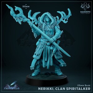 May include: A blue plastic miniature figurine of a female warrior with a staff and a sword. She is wearing a hooded cloak and a fur-lined tunic. The figurine is standing on a black base. The text "NERIKKI, CLAN SPIRITALKER" is printed below the base.