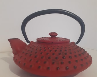 Vintage Japanese teapot in red enameled cast iron