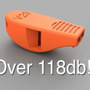 May include: An orange whistle with the text "V29" on the side. The whistle is designed to produce a loud sound, over 118 decibels.