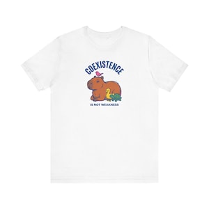 Coexistence Is Not Weakness Capybara Tee, Riso Animal Solidarity Graphic T-Shirt, Calm Resistance Protest Shirt, Kindness Gift image 1