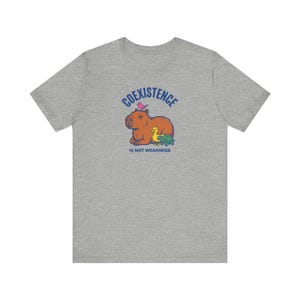 Coexistence Is Not Weakness Capybara Tee, Riso Animal Solidarity Graphic T-Shirt, Calm Resistance Protest Shirt, Kindness Gift image 5