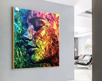 Puede incluir: Impresión de arte abstracto con un retrato de mosaico colorido de una cara. La cara está compuesta por varios tonos de azul, verde, amarillo, naranja y rojo.