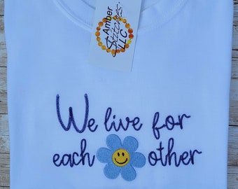 Alpha Delta Pi "We live for each other" t-shirt with smiley face flower graphic