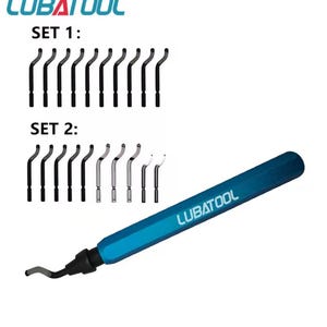 May include: A set of black and silver scraper blades with a blue handle. The image shows two sets of blades, labeled "SET 1" and "SET 2", and a blue handle with the text "LUBATOOL". The blades are curved and designed for scraping.