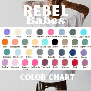 May include: A color chart with the text "REBEL Babes" at the top. The chart displays a variety of color swatches, including violet, ivory, bay, pepper, watermelon, blue jean, moss, lagoon blue, and many more. The text "COLOR CHART" is at the bottom.